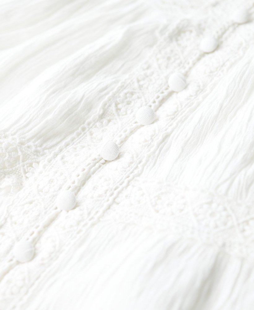 sukienka alana z koronkowym wykończeniem na ramiączkach w kolorze off white