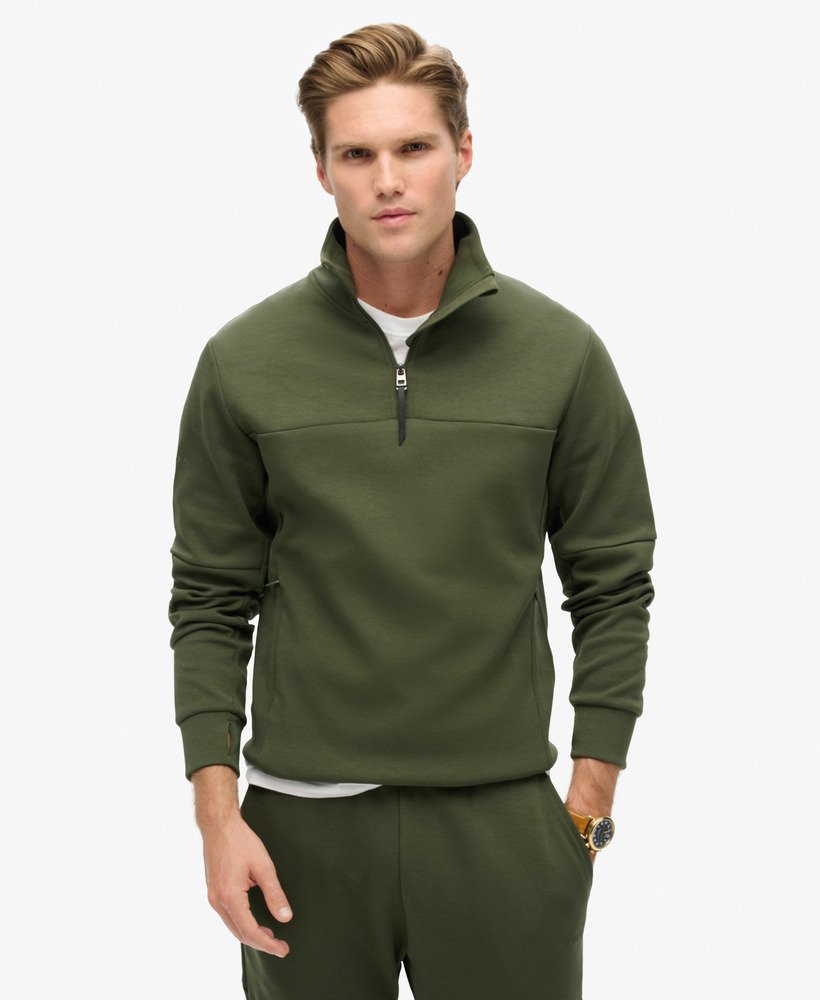 bluza tech loose half zip w kolorze ciemnej zieleni mchu