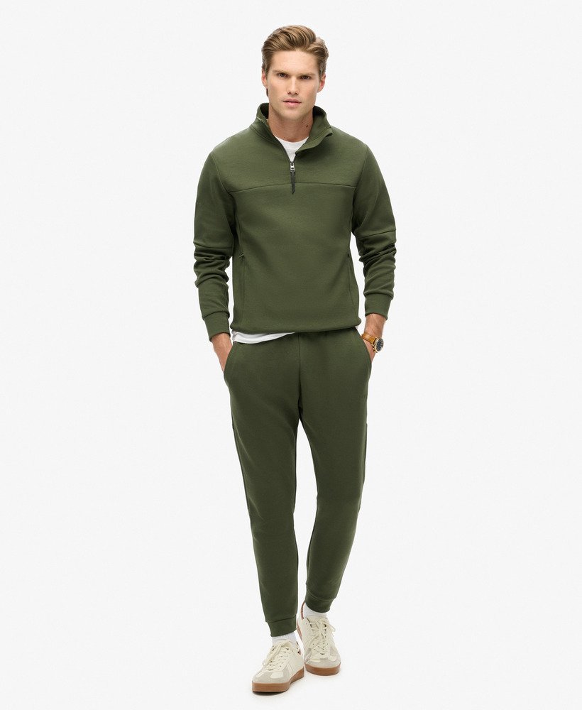 bluza tech loose half zip w kolorze ciemnej zieleni mchu