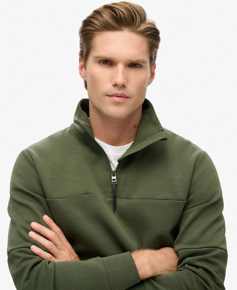 bluza tech loose half zip w kolorze ciemnej zieleni mchu