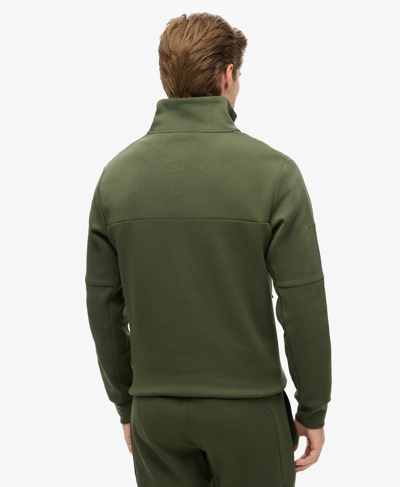 bluza tech loose half zip w kolorze ciemnej zieleni mchu