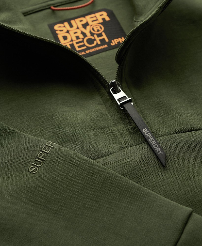 bluza tech loose half zip w kolorze ciemnej zieleni mchu