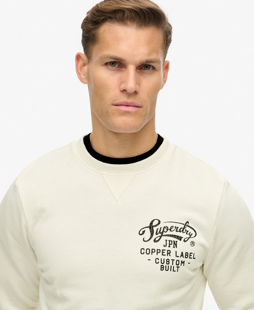 bluza z nadrukiem copper label graphic crew w kolorze kremowym
