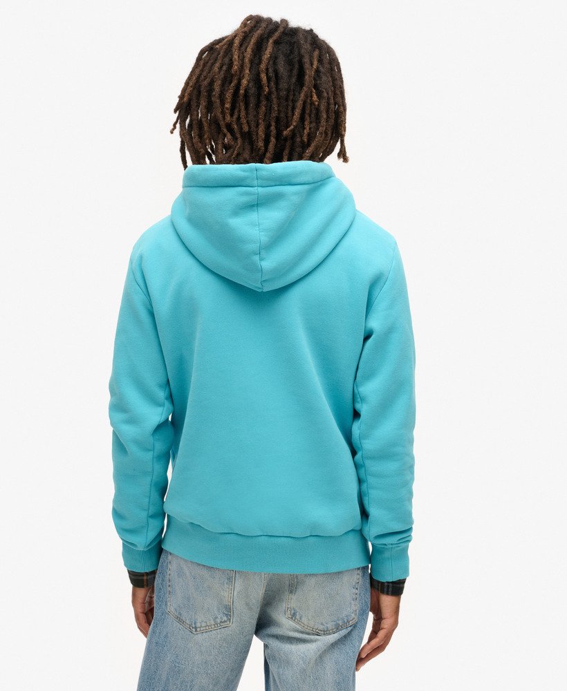 bluza z kapturem z grafiką pocztówki podróżnej w kolorze maui blue