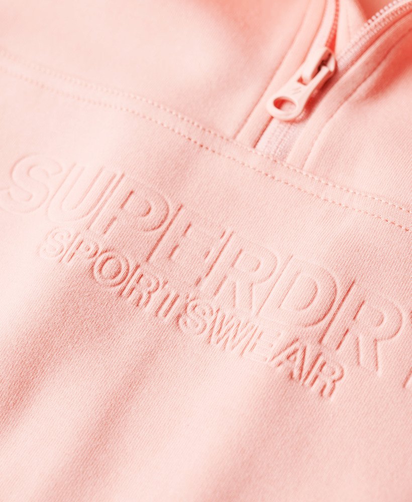 sport tech relaxed half zip w kolorze brzoskwiniowo-różowym