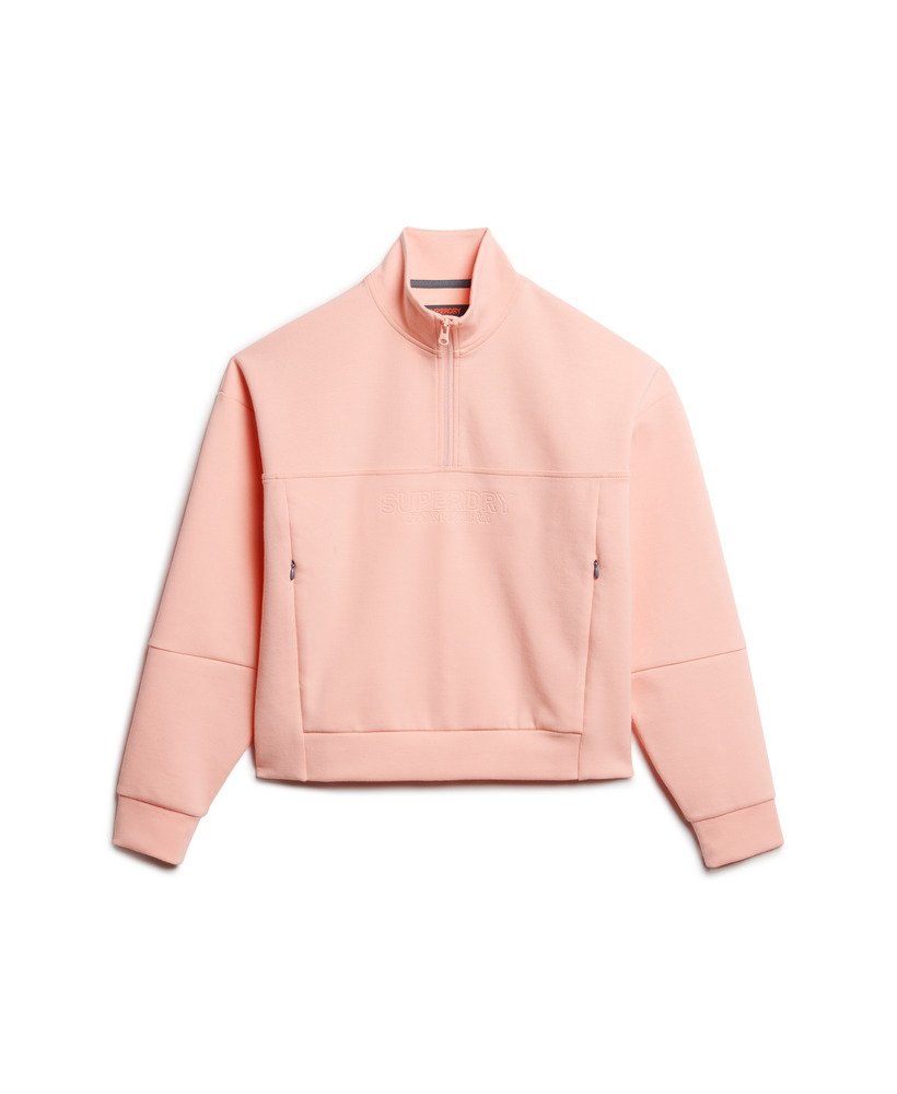 sport tech relaxed half zip w kolorze brzoskwiniowo-różowym