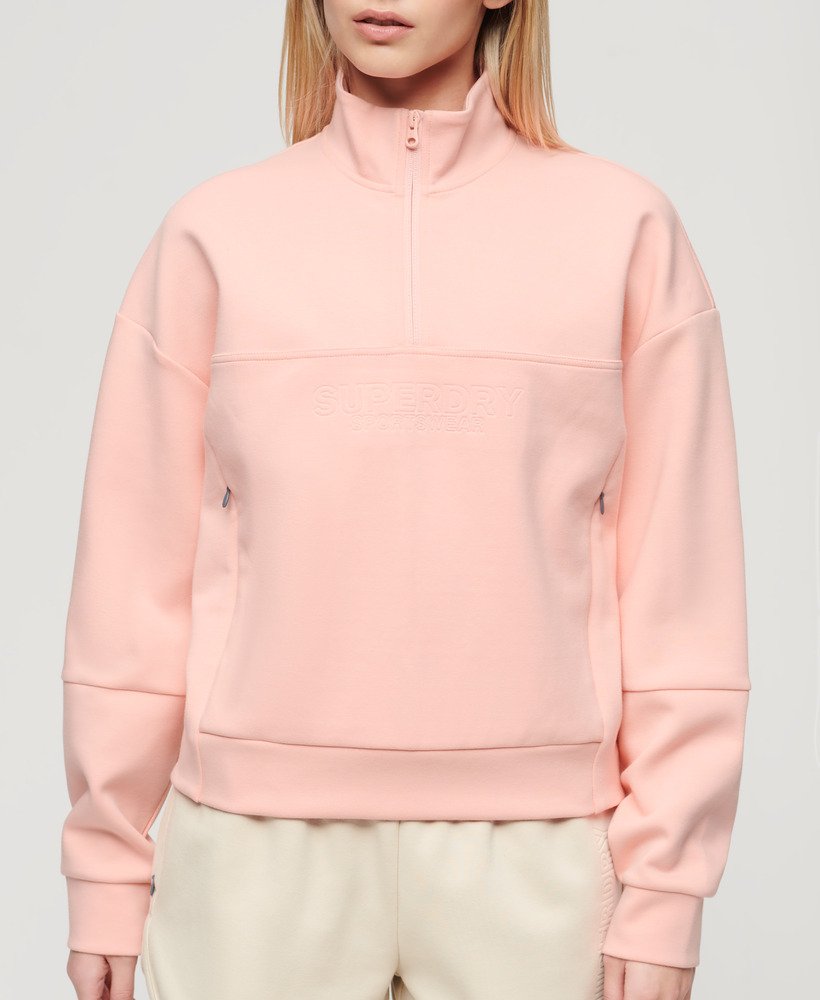 sport tech relaxed half zip w kolorze brzoskwiniowo-różowym