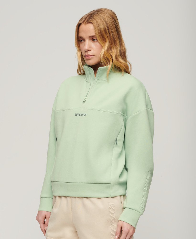 sport tech relaxed half zip w kolorze morskiej zieleni