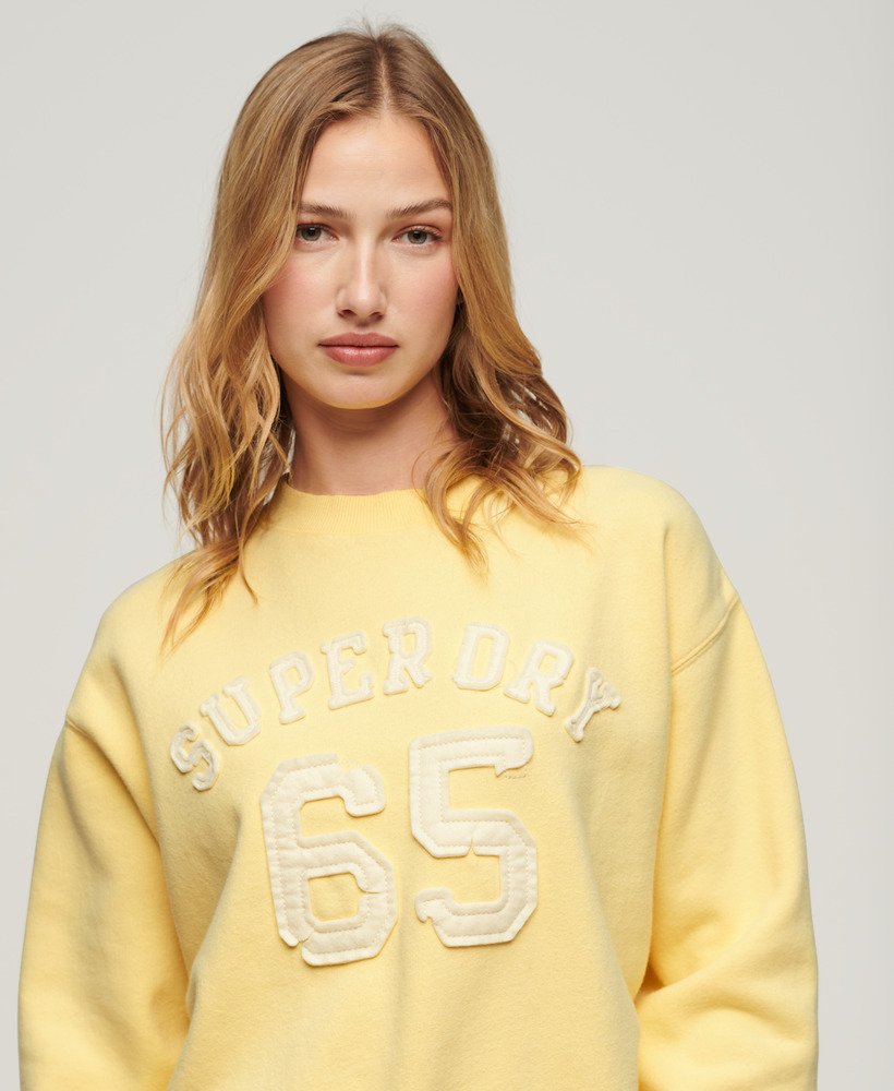 bluza sportowa z aplikacją i luźnym krojem w kolorze jasnożółtym