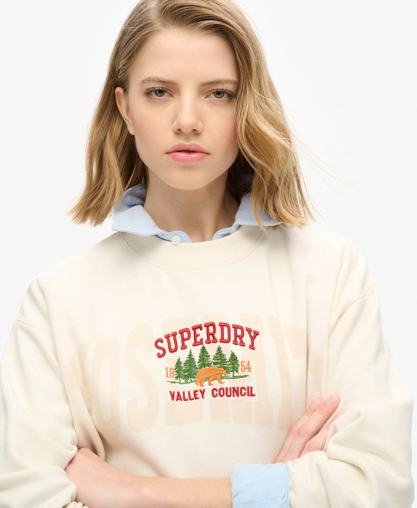 bluza z luźnym okrągłym dekoltem travel souvenir w kolorze kremowym