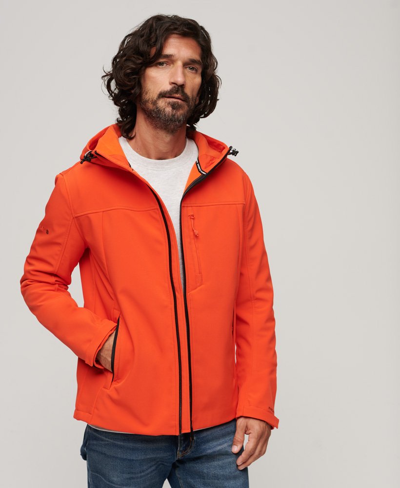 kurtka typu softshell z kapturem i podszewką z polaru w intensywnym pomarańczowym kolorze