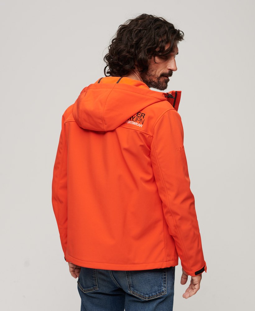 kurtka typu softshell z kapturem i podszewką z polaru w intensywnym pomarańczowym kolorze