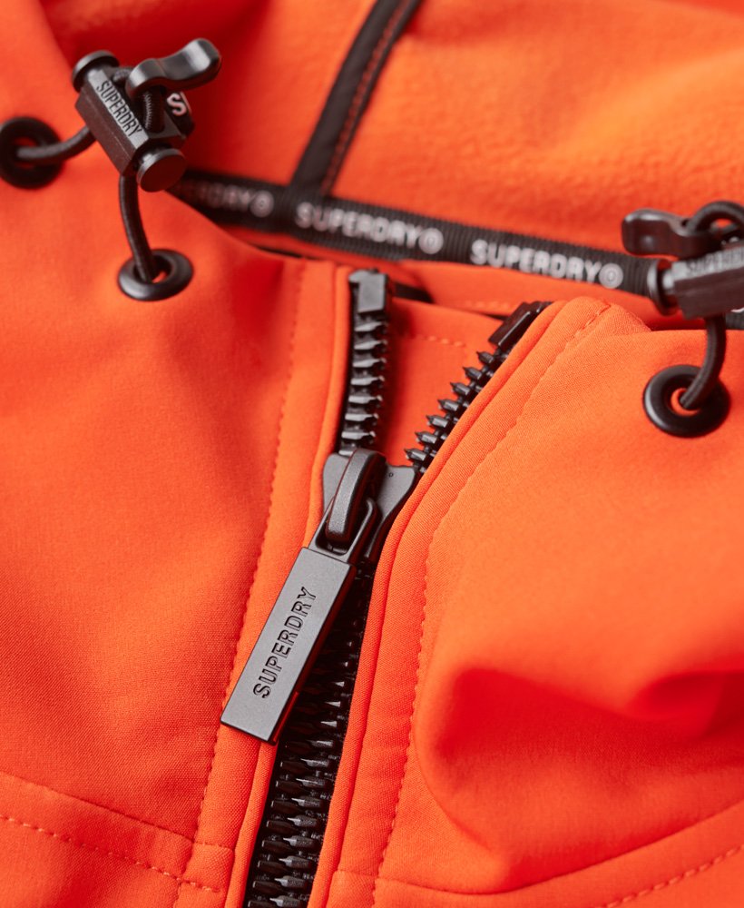 kurtka typu softshell z kapturem i podszewką z polaru w intensywnym pomarańczowym kolorze
