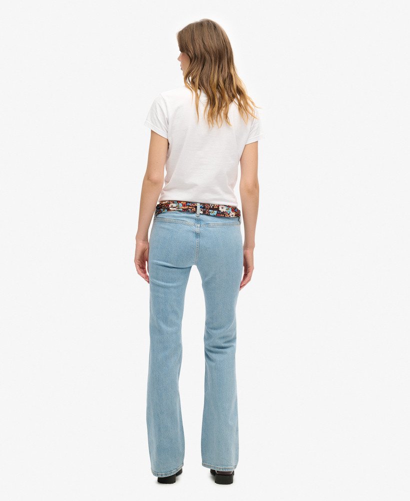 jeansy vintage z niskim stanem i rozszerzanymi nogawkami z bawełny organicznej w kolorze heritage mid wash