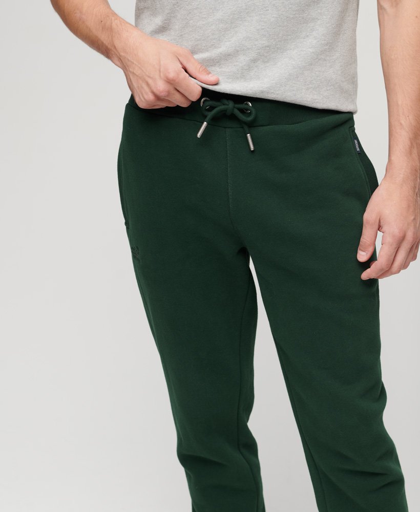 spodnie dresowe essential logo w kolorze forest green