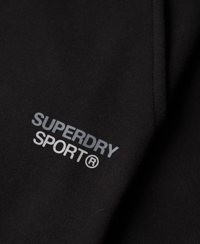 spodnie dresowe sport tech tapered w kolorze czarnym