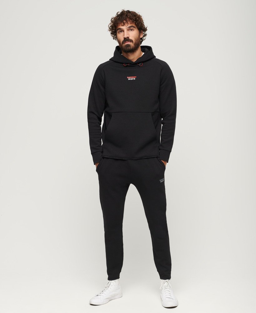 spodnie dresowe sport tech tapered w kolorze czarnym