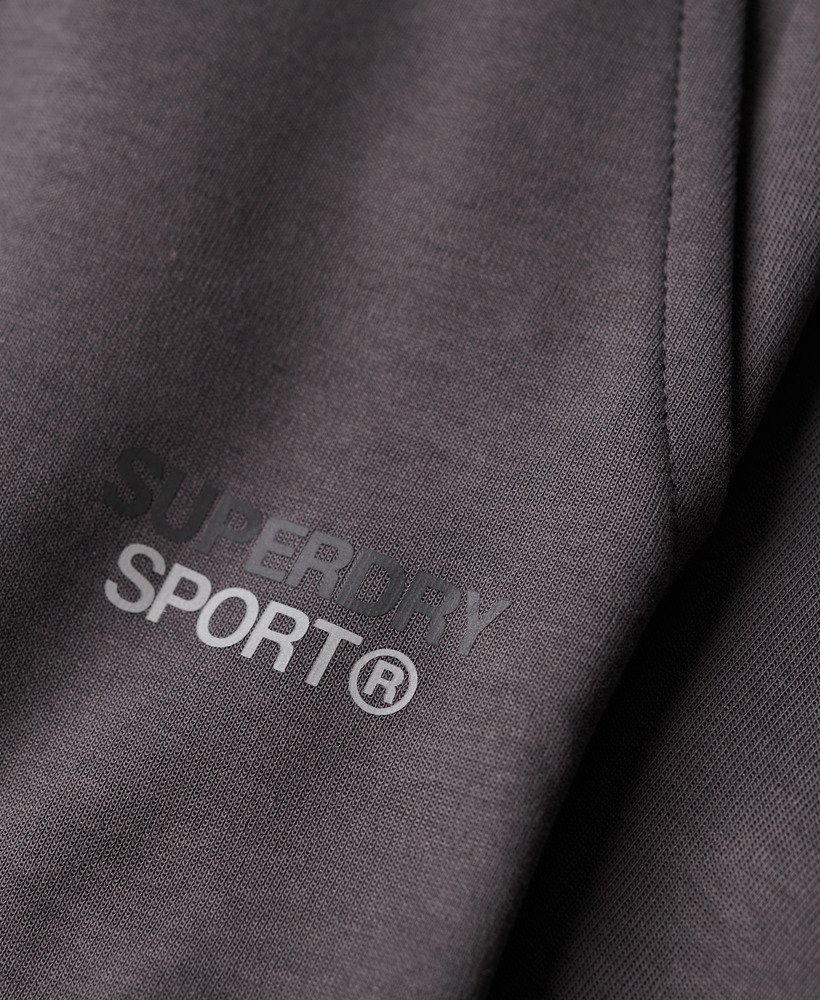 spodnie dresowe sport tech tapered w kolorze ciemnoszarym