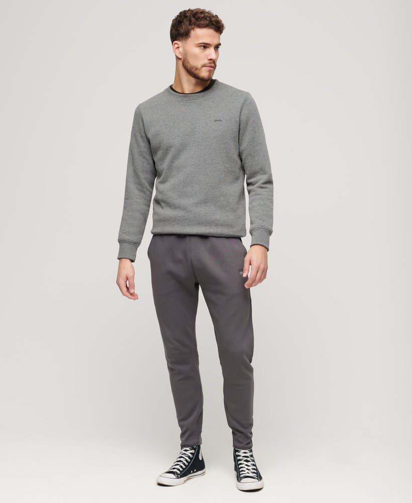 spodnie dresowe sport tech tapered w kolorze ciemnoszarym
