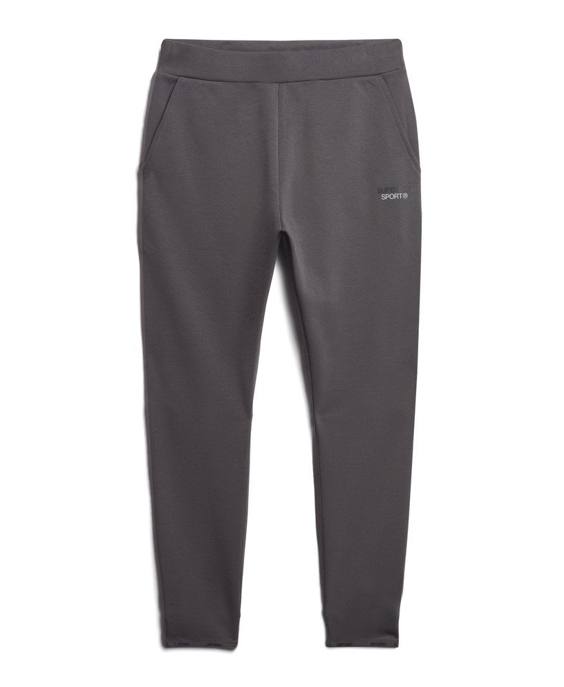 spodnie dresowe sport tech tapered w kolorze ciemnoszarym