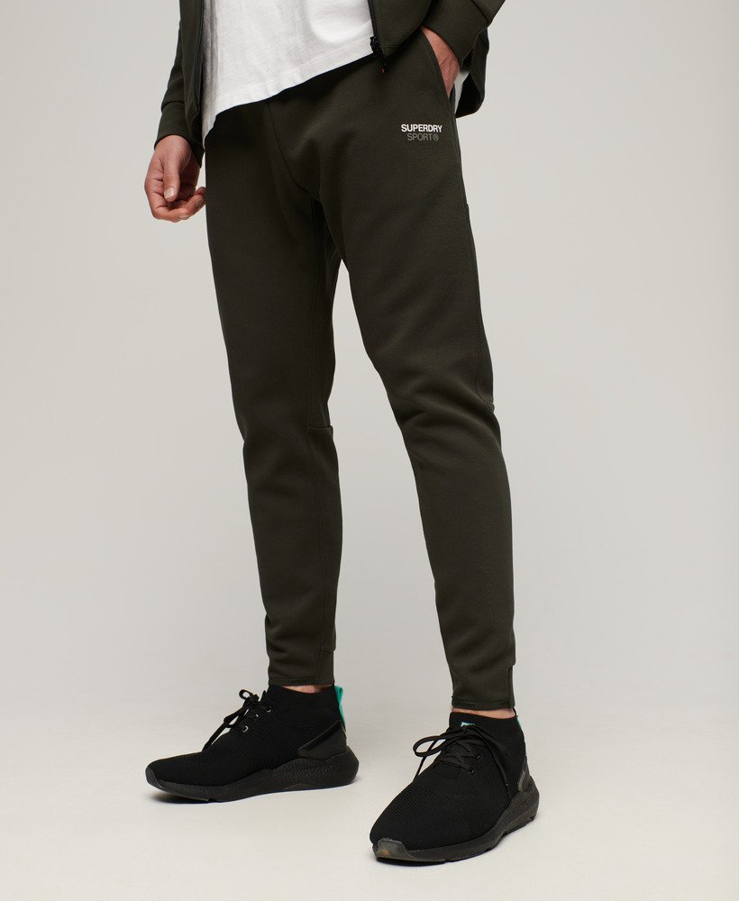 spodnie dresowe sport tech tapered w kolorze army khaki