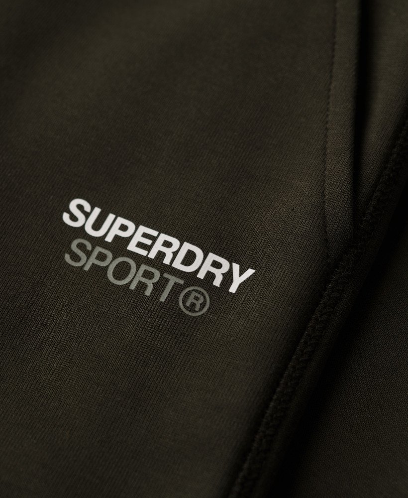 spodnie dresowe sport tech tapered w kolorze army khaki
