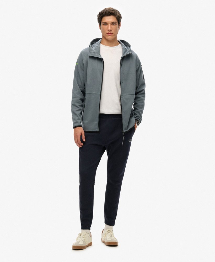 spodnie dresowe sport tech logo tapered joggers w kolorze eclipse navy