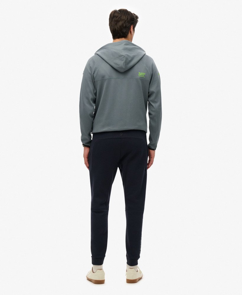 spodnie dresowe sport tech logo tapered joggers w kolorze eclipse navy