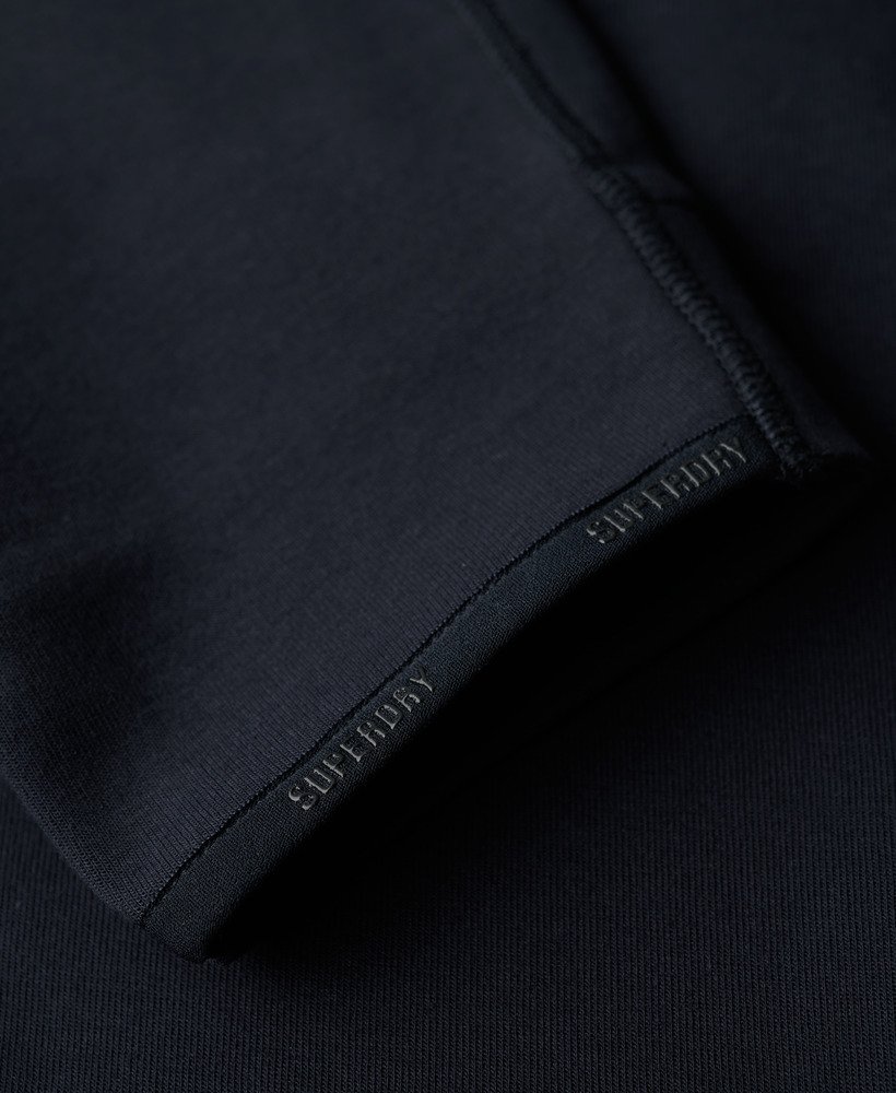 spodnie dresowe sport tech logo tapered joggers w kolorze eclipse navy