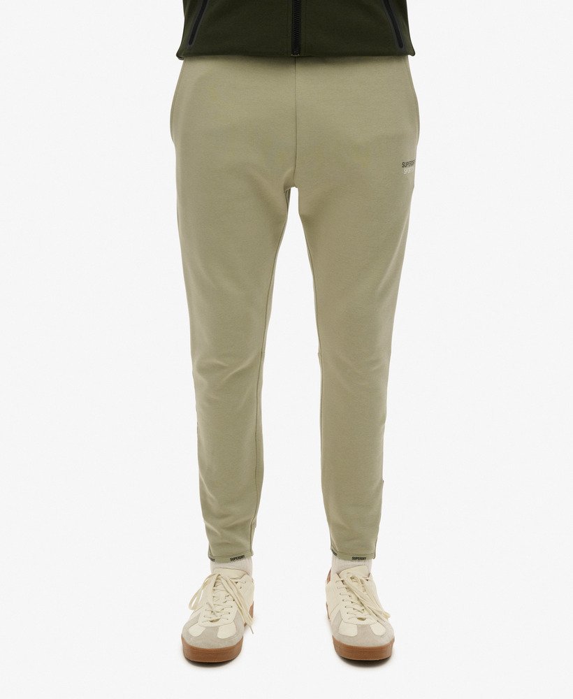 spodnie dresowe sport tech logo tapered w kolorze trawy morskiej