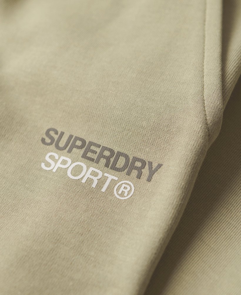 spodnie dresowe sport tech logo tapered w kolorze trawy morskiej