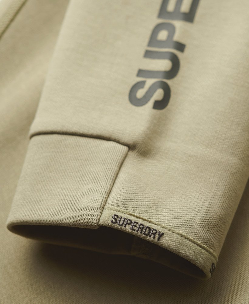spodnie dresowe sport tech logo tapered w kolorze trawy morskiej