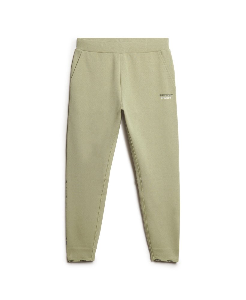 spodnie dresowe sport tech logo tapered w kolorze trawy morskiej