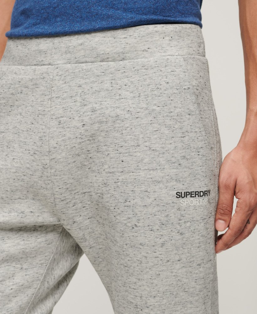 spodnie dresowe sport tech logo tapered w kolorze athletic grey marl