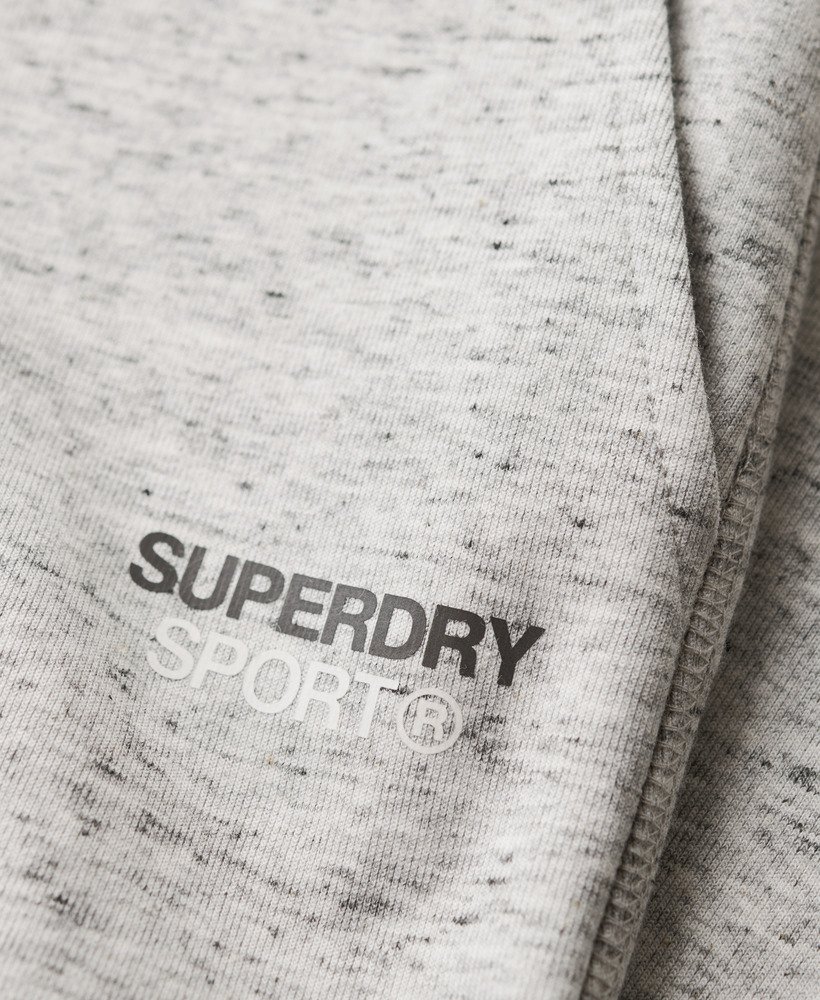 spodnie dresowe sport tech logo tapered w kolorze athletic grey marl