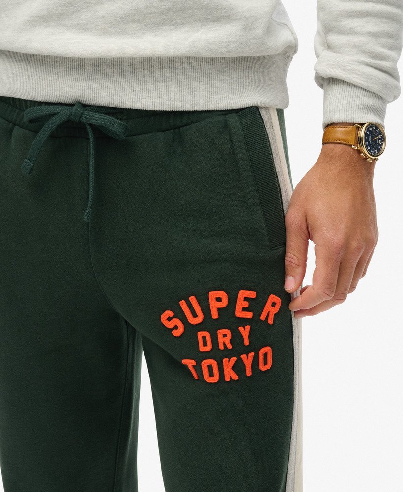 spodnie dresowe vintage athletic w kolorze academy dark green