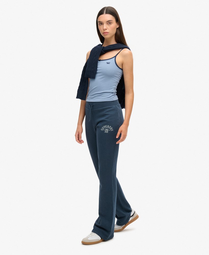 spodnie dresowe athletic essentials jersey flare joggers w kolorze jagodowo-granatowym