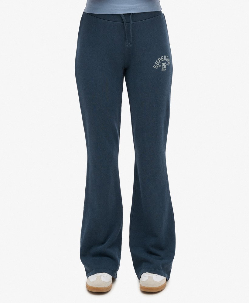 spodnie dresowe athletic essentials jersey flare joggers w kolorze jagodowo-granatowym