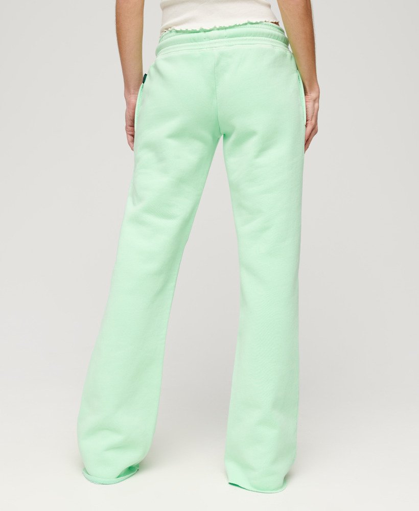 spodnie dresowe neon vintage z niskim stanem i rozszerzanymi nogawkami w kolorze neo mint green
