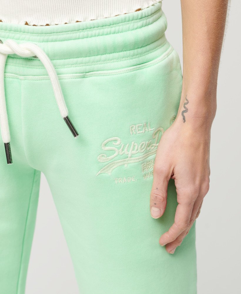 spodnie dresowe neon vintage z niskim stanem i rozszerzanymi nogawkami w kolorze neo mint green