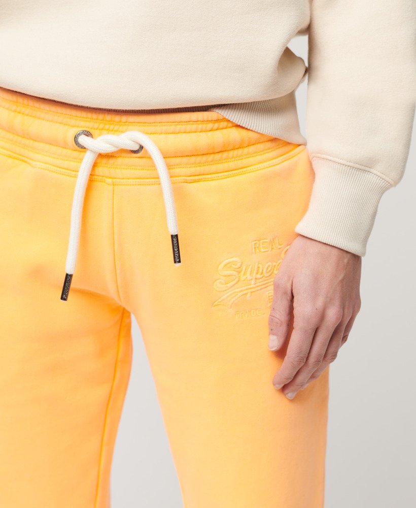 spodnie dresowe neon vintage z niskim stanem i rozszerzanymi nogawkami w kolorze pop orange