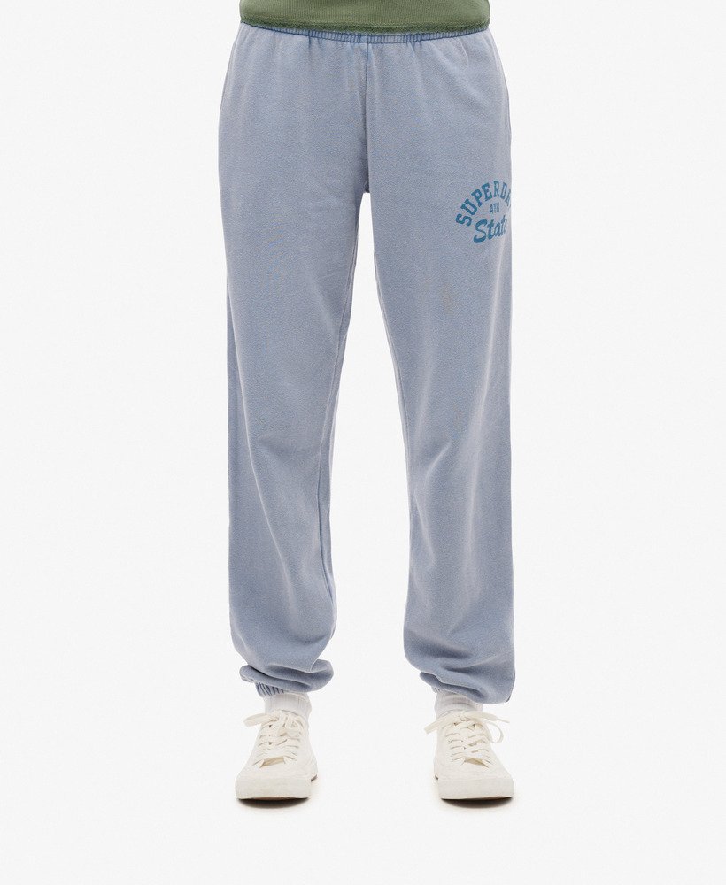 spodnie dresowe athletic essentials vintage washed graphic w kolorze tidal blue