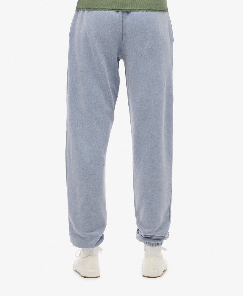 spodnie dresowe athletic essentials vintage washed graphic w kolorze tidal blue