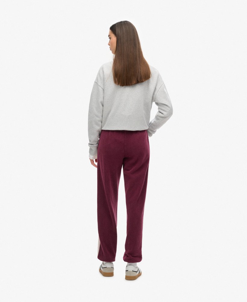 spodnie dresowe athletic essentials vintage side stripe w kolorze port red