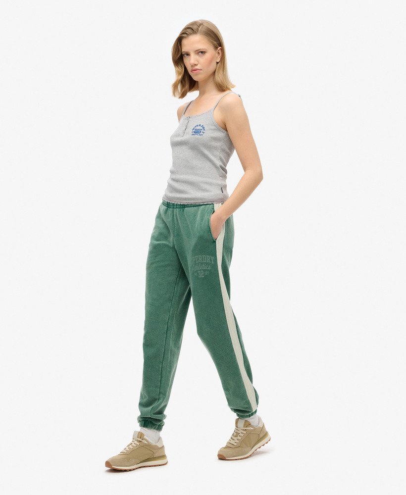 spodnie dresowe athletic essentials vintage side stripe w kolorze pine green