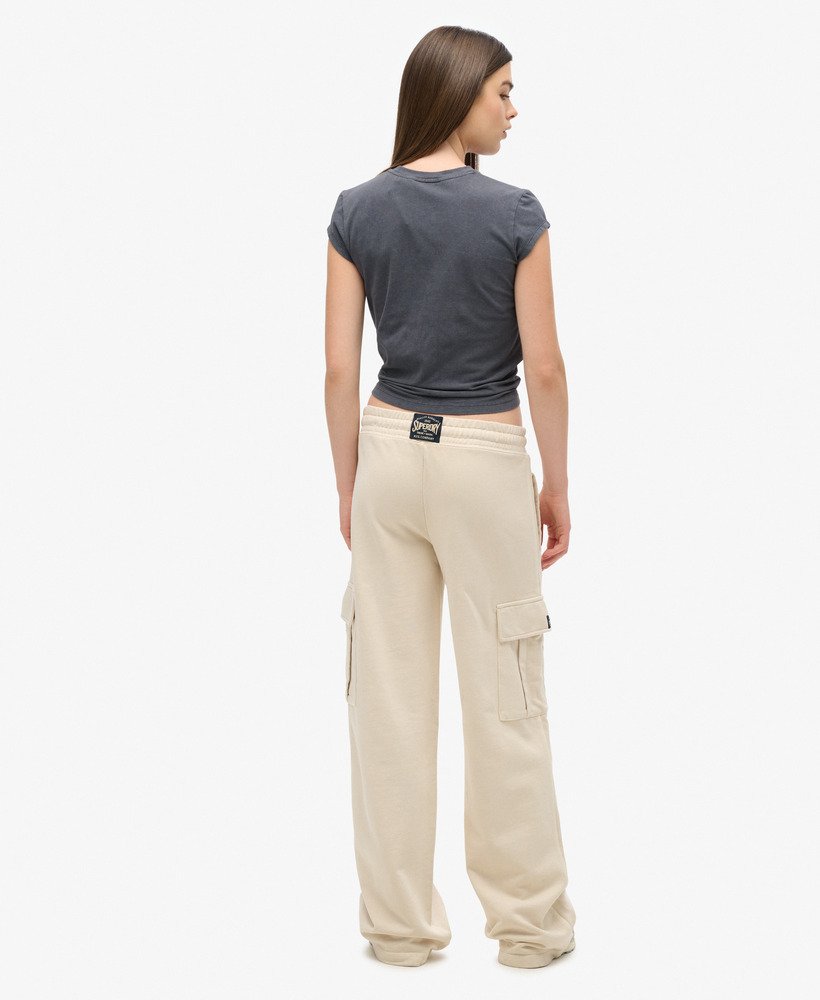 spodnie dresowe athletic essentials vintage wide cargo w kolorze ecru