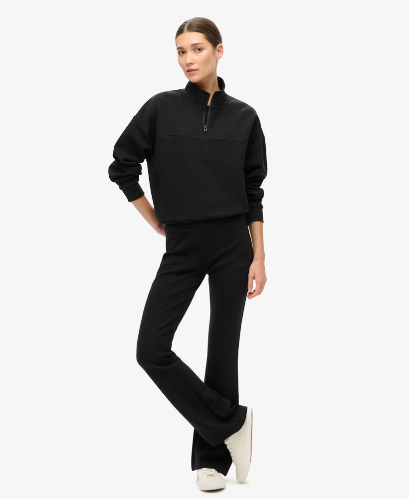 spodnie dresowe sport tech low rise flared w kolorze czarnym