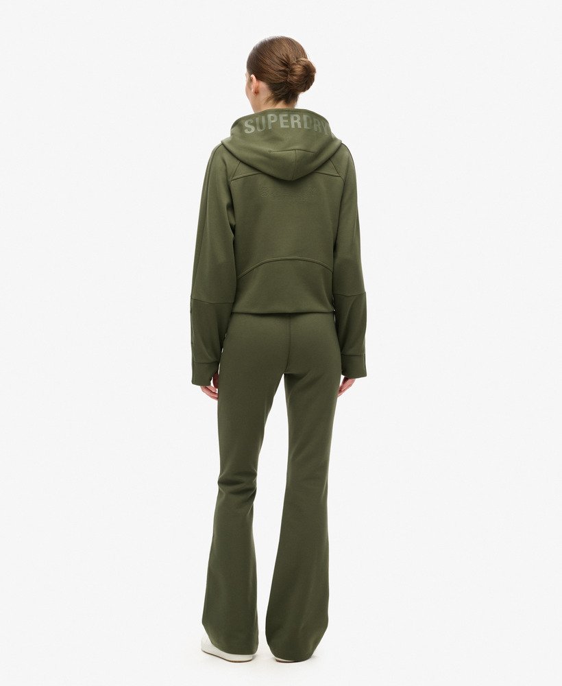 spodnie dresowe sport tech low rise flared w kolorze army khaki