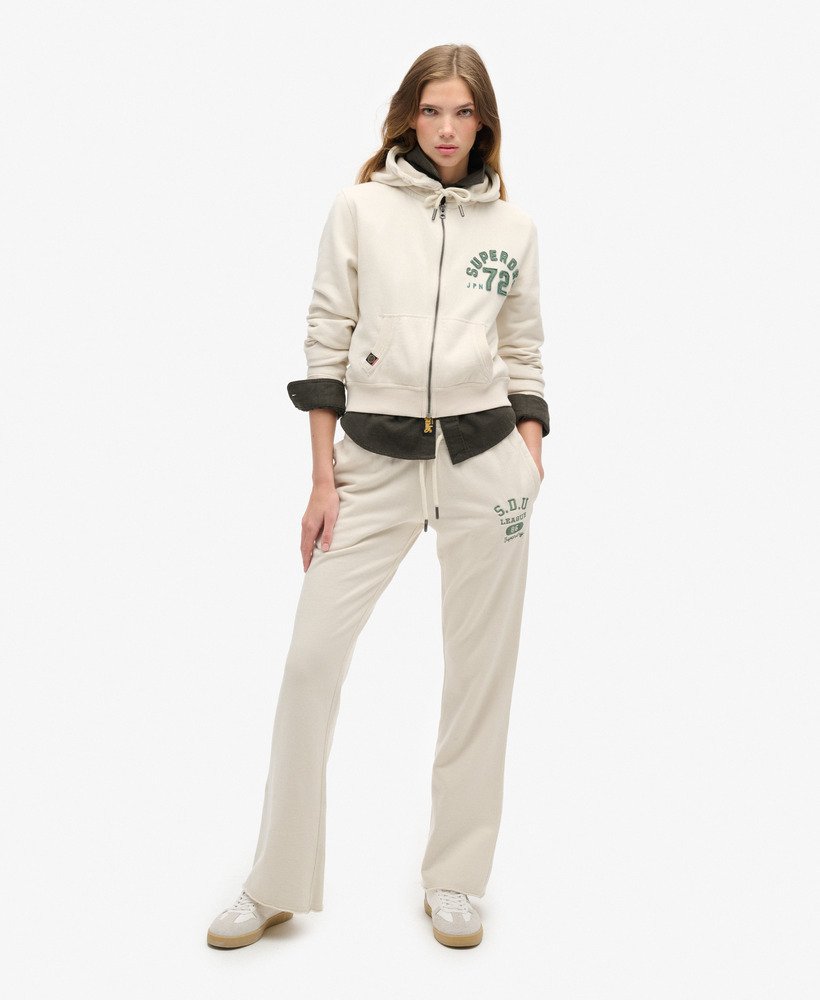 spodnie dresowe athletic essentials low rise flare w kolorze turtledove cream