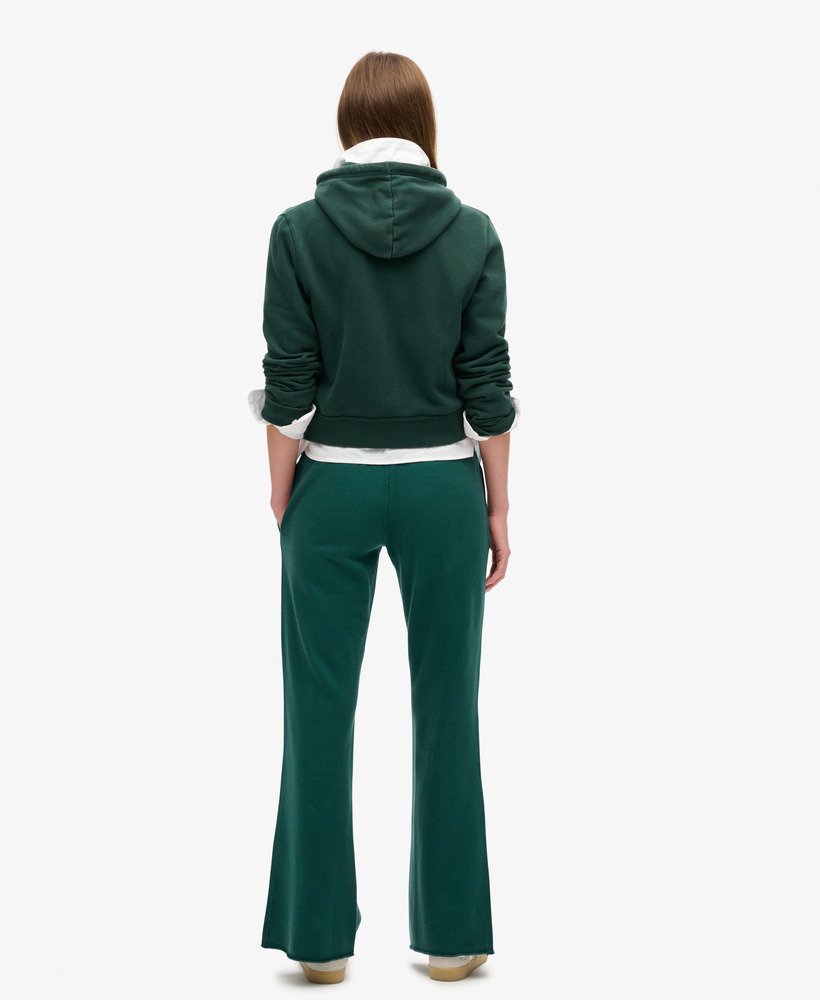 spodnie dresowe athletic essentials low rise flare w kolorze ciemnej sosny